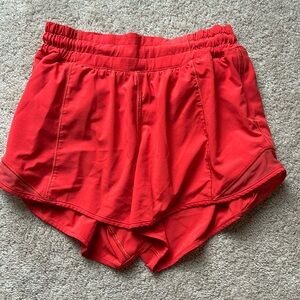 Carnation Red Lululemon Hotty Hot shorts
Low rise 4 inch inseam